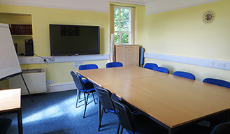 Room 1: A 50'' plasma screen, perfect for presentations and video-conferences